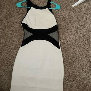 Black and White body con dress with mesh detailing